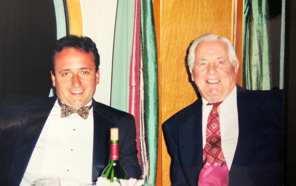 Two generations at a formal dinner