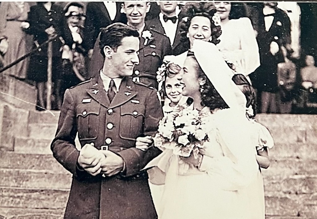 Gene and Jackie on their wedding day, descending church steps